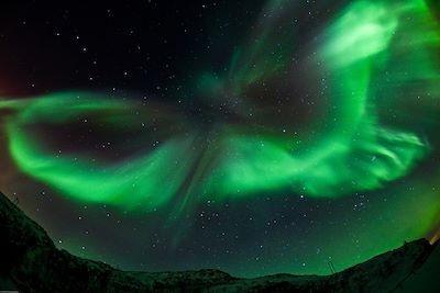 © Gaute Bruvik/OT Nord Norge - Aurore Boréale sur Tromso - Norvège Aurore Boréale sur Tromso - Norvège